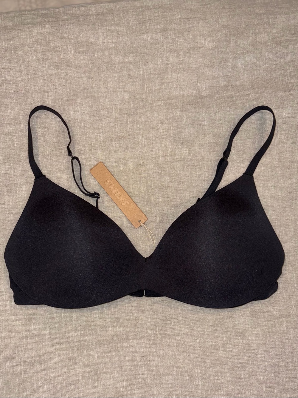SKIMS Black Seamless Lightly Molded Bra with Adjustable Straps